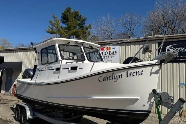Slide: The Image of 2020 Eastern 248 Explorer boat named "Caitlyn Irene" on trailer at boat sales lot. - 4
