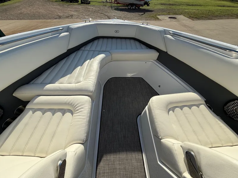 Slide: The Image of Interior of a 2015 Cobalt R7 boat with white leather seating. - 12