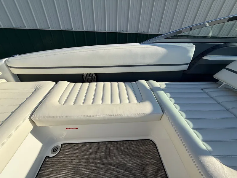 Slide: The Image of Interior of a 2015 Cobalt R7 boat with white leather seating. - 15