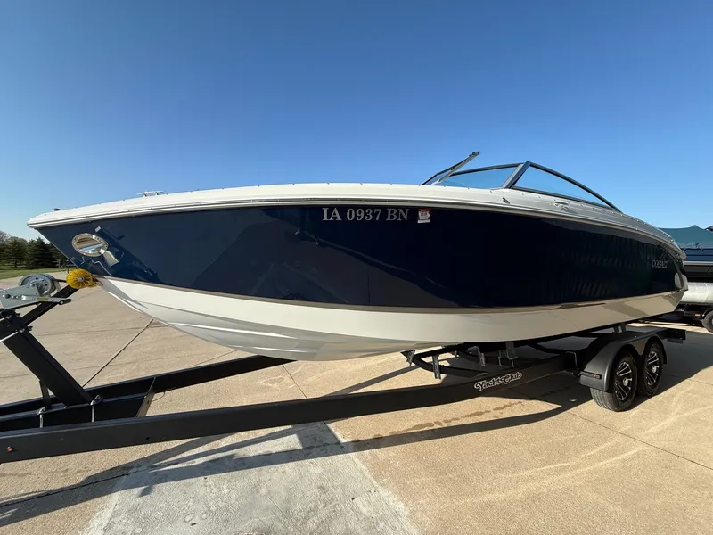 Slide: The Image of 2015 Cobalt R7 boat on trailer, blue sky. - 2