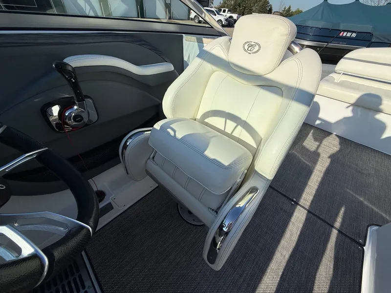 Slide: The Image of Interior of a 2015 Cobalt R7 boat with white leather seat. - 23