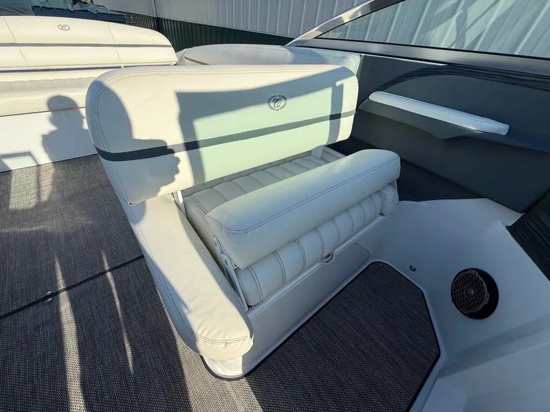 Slide: The Image of Interior of a 2015 Cobalt R7 boat with white leather seats. - 24