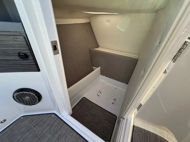 Slide: The Image of Interior of a 2015 Cobalt R7 with gray carpeting. - 25