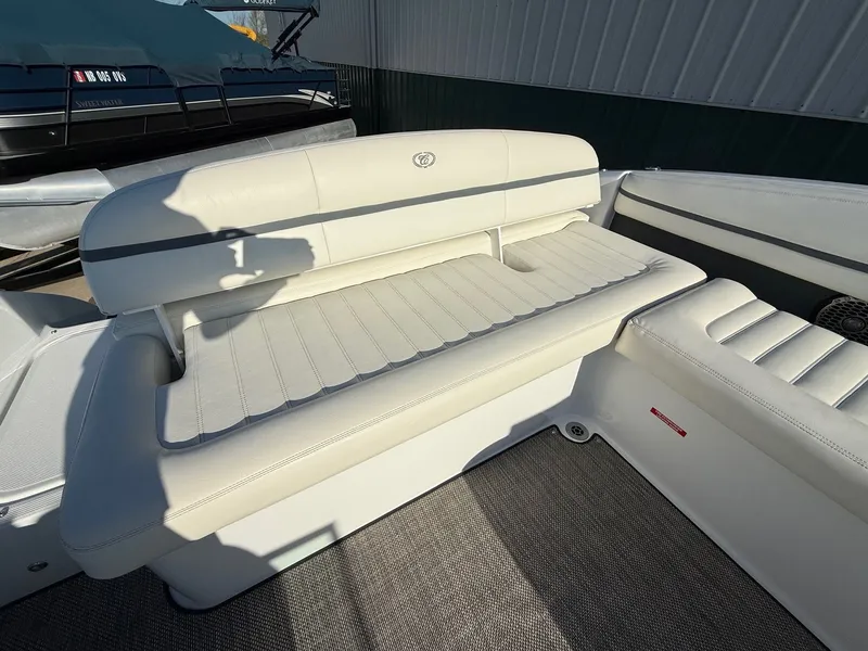 Slide: The Image of Interior of a 2015 Cobalt R7 boat with white leather seating. - 27
