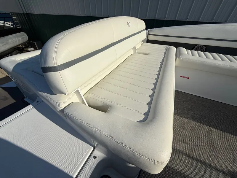 Slide: The Image of White leather seating on a 2015 Cobalt R7 boat. - 30