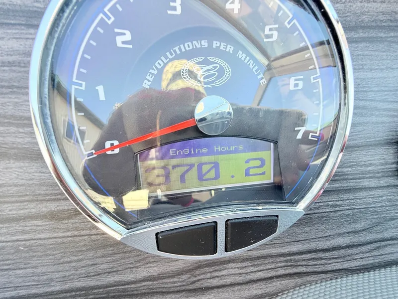 Slide: The Image of Cobalt R7 boat tachometer displaying 370.2 engine hours. - 35