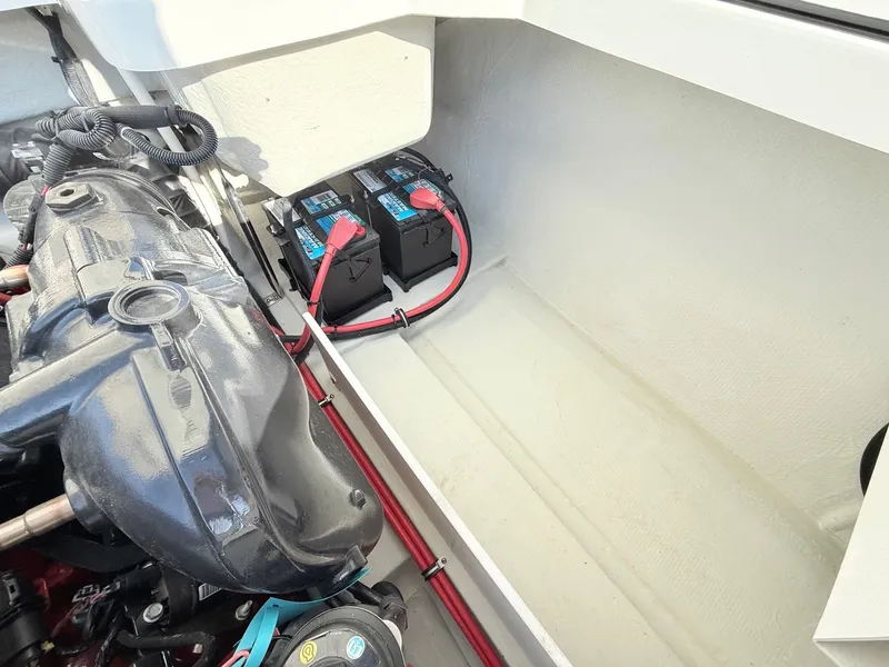 Slide: The Image of Engine compartment of 2015 Cobalt R7 boat with batteries. - 42