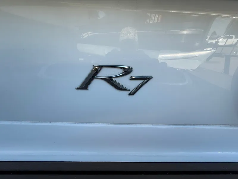 Slide: The Image of Cobalt R7 2015 emblem on white background. - 6