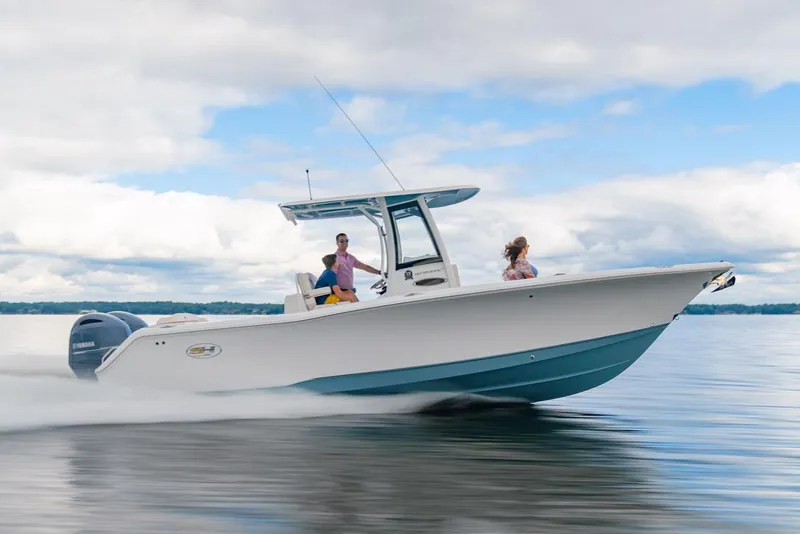 The Image of 2021 Sea Hunt Ultra 275 SE boat on trailer, parked outdoors. - 0