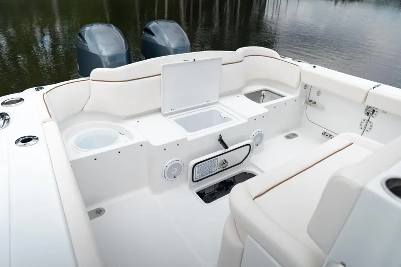 Slide: The Image of Cushions for 2021 Sea Hunt Ultra 275 SE boat on wooden floor. - 14