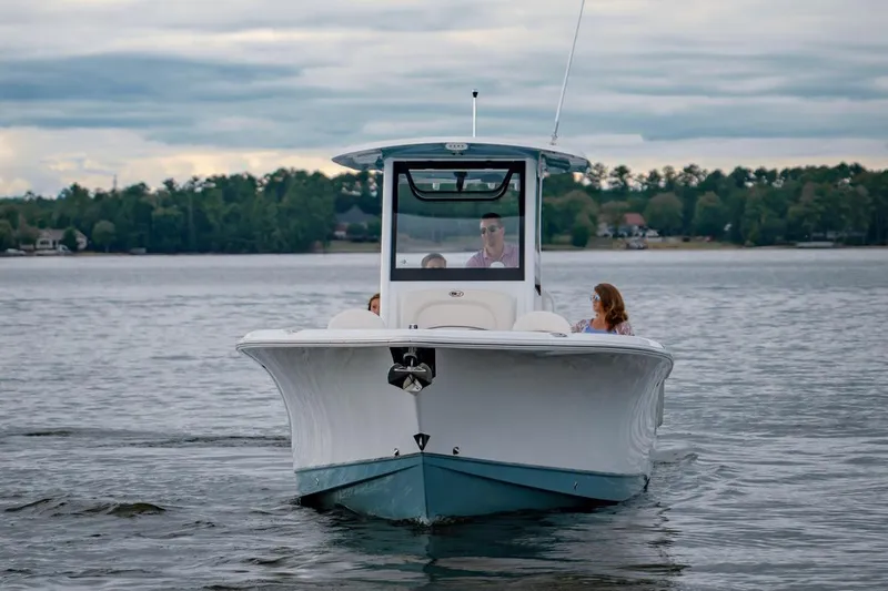 Slide: The Image of 2021 Sea Hunt Ultra 275 SE boat with dual Yamaha outboard motors on a trailer. - 5