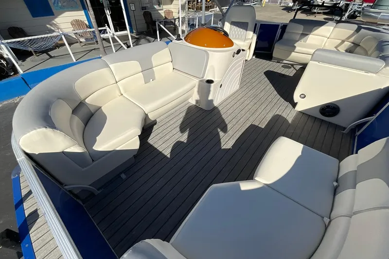 Slide: The Image of Luxurious seating on a 2021 Lexington 318 3 Series pontoon boat deck. - 9