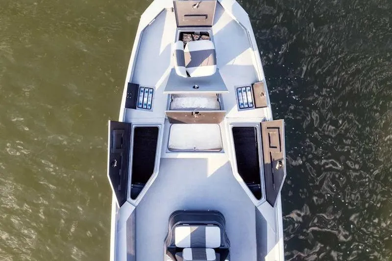 Slide: The Image of Overhead view of 2026 Excel 230 Bay Pro Elite boat on water. - 8