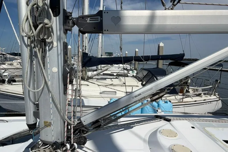 Slide: The Image of Sailboat rigging on a 2002 Hunter 410 yacht docked at a marina. - 29