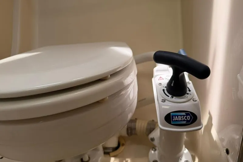 Slide: The Image of Marine toilet with Jabsco pump handle, Hunter 410 model, 2002. - 53