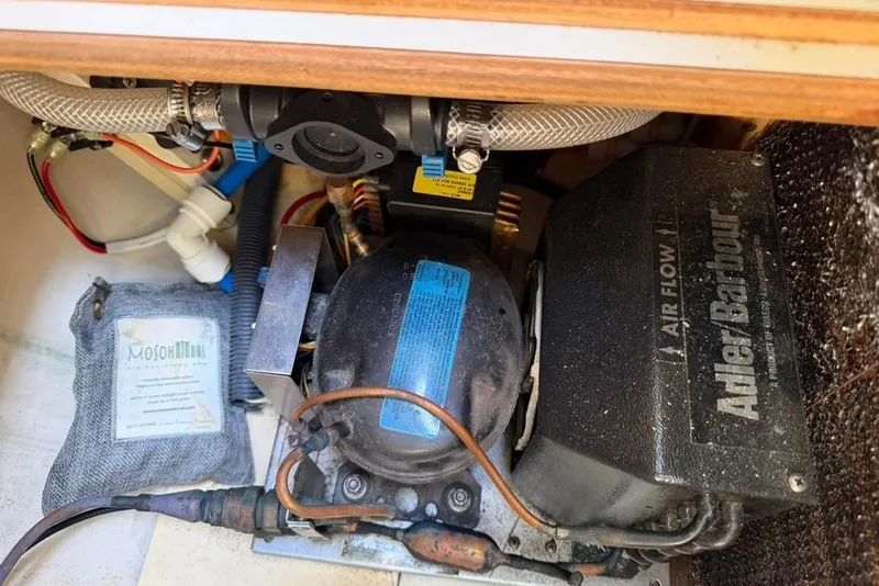 Slide: The Image of Adler Barbour refrigeration unit in a 2002 Hunter 410 boat. - 64