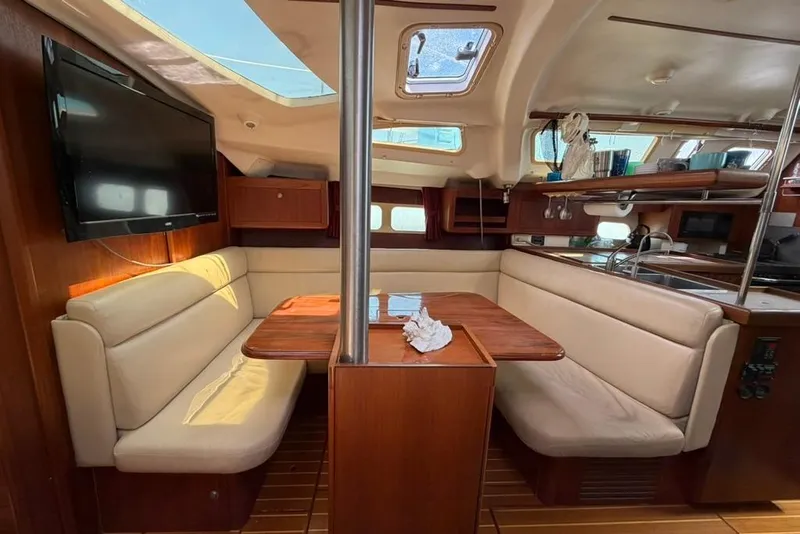 Slide: The Image of Interior of 2002 Hunter 410 yacht with cozy seating and modern amenities. - 71