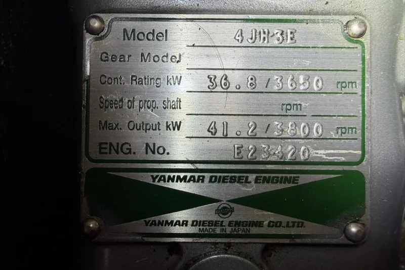 Slide: The Image of Yanmar diesel engine plate, model 4JH3E, showing specifications and engine number E23420. - 86