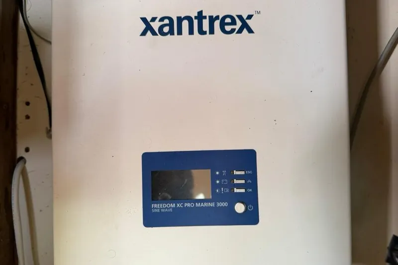 Slide: The Image of Xantrex Freedom XC Pro Marine 3000 inverter on Hunter 410, 2002 model. - 92