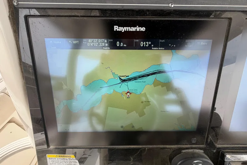 Slide: The Image of Raymarine navigation display on 2016 Boston Whaler 330 Outrage, showing Navesink River map. - 19