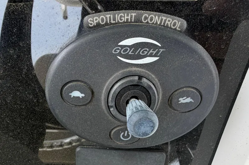 Slide: The Image of Spotlight control panel on 2016 Boston Whaler 330 Outrage boat. - 26
