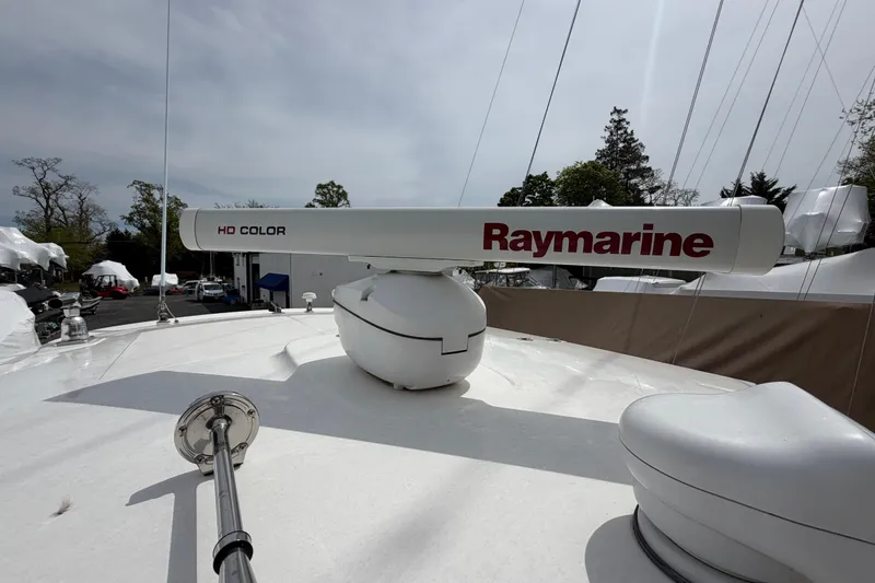 Slide: The Image of Raymarine radar on 2016 Boston Whaler 330 Outrage boat, showcasing HD Color technology. - 46