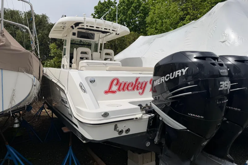 Slide: The Image of 2016 Boston Whaler 330 Outrage boat with twin Mercury Verado 350 engines. - 47