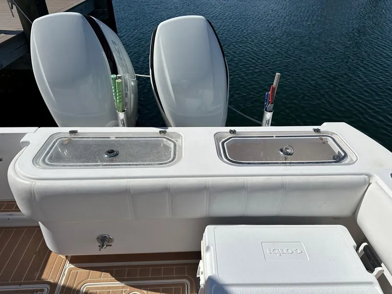 Slide: The Image of 2007 Contender 33 Tournament boat with dual outboard motors and fishing equipment. - 20