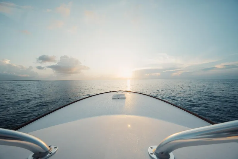 Slide: The Image of Bow of 2016 F&S Express boat at sunrise on calm ocean. - 10