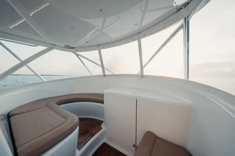 Slide: The Image of Interior of 2016 F&S Express boat with cushioned seating and ocean view. - 11