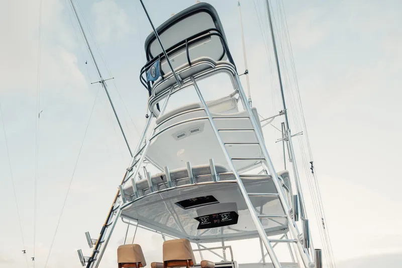 Slide: The Image of 2016 F&S Express yacht tower with ladder and equipment against a clear sky. - 18