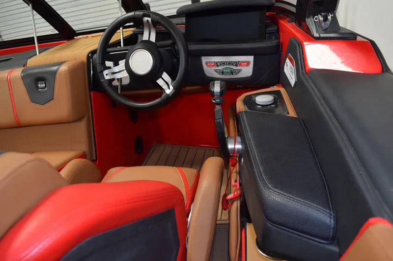Slide: The Image of 2024 Nautique Ski Nautique interior with modern dashboard and steering wheel design. - 8