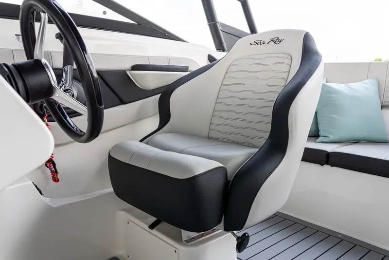 Slide: The Image of Manufacturer Provided Image: 2022 Sea Ray SPX 190 OB boat interior with captain's chair and steering wheel. - 7