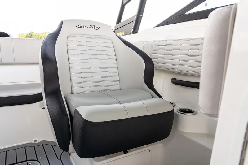 Slide: The Image of Manufacturer Provided Image: 2022 Sea Ray SPX 190 OB captain's chair with white and black upholstery. - 8