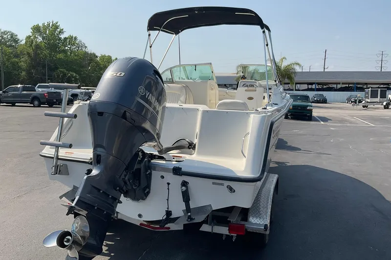 Slide: The Image of 2009 Hydra-Sports Lightning 202 DC boat with Yamaha outboard motor in parking lot. - 4