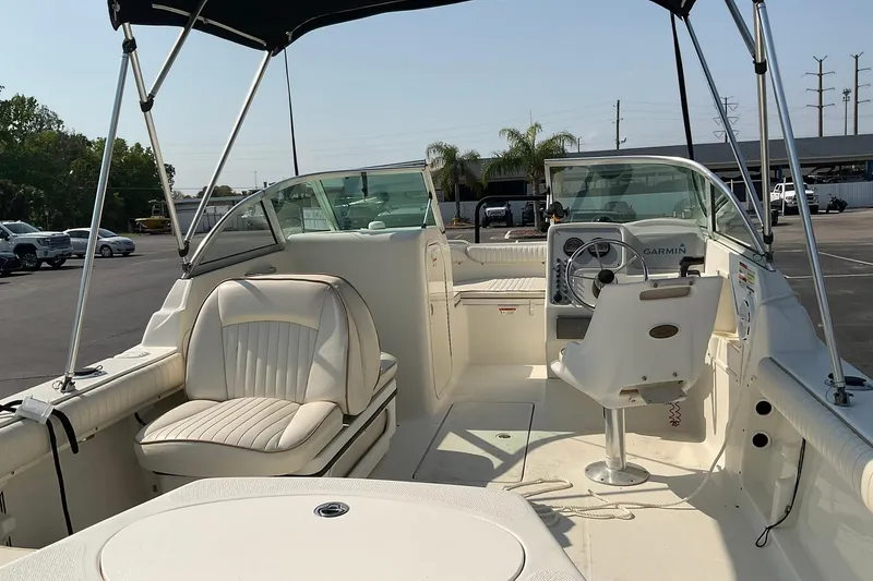 Slide: The Image of 2009 Hydra-Sports Lightning 202 DC boat interior with seating and steering console. - 5