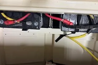 Slide: The Image of Battery compartment of 2021 Scout 215 Dorado boat with visible wiring connections. - 14