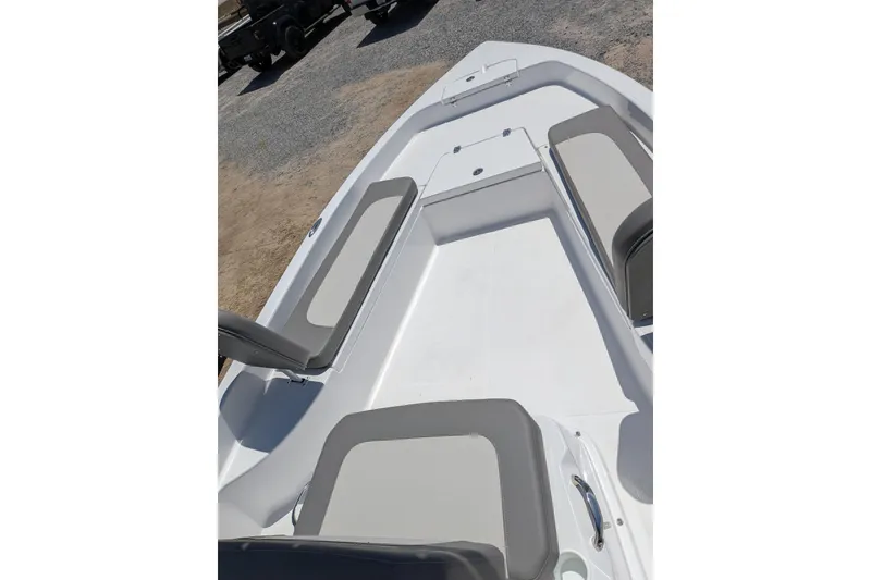Slide: The Image of 2026 Clearwater 21 Bay boat interior with gray seating and spacious deck. - 5