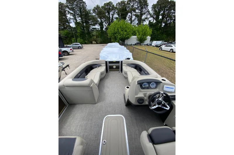 Slide: The Image of 2023 Barletta ARIA 22UC pontoon boat interior with plush seating and modern dashboard. - 11