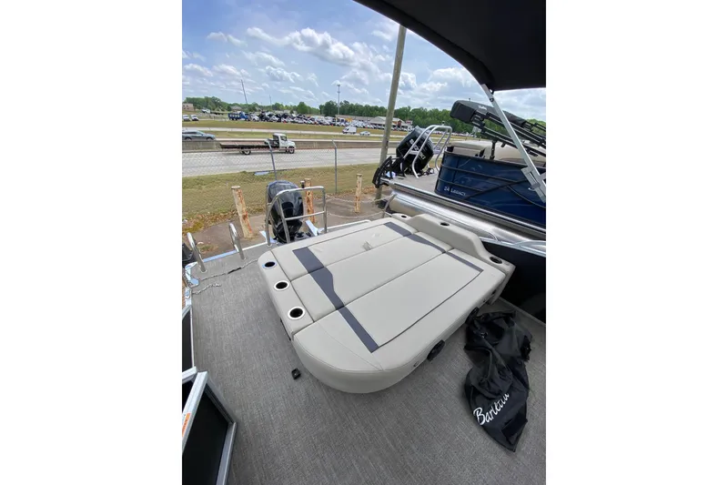 Slide: The Image of 2023 Barletta ARIA 22UC pontoon boat with spacious seating and modern design. - 3