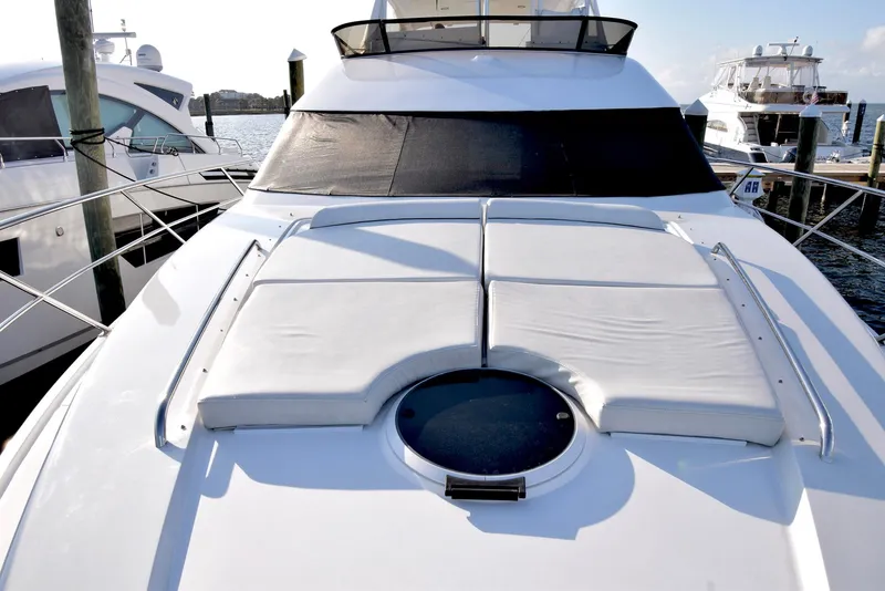 Slide: The Image of Luxury Neptunus 58 yacht, 2010 model, with sunbathing deck and sleek design at marina. - 20