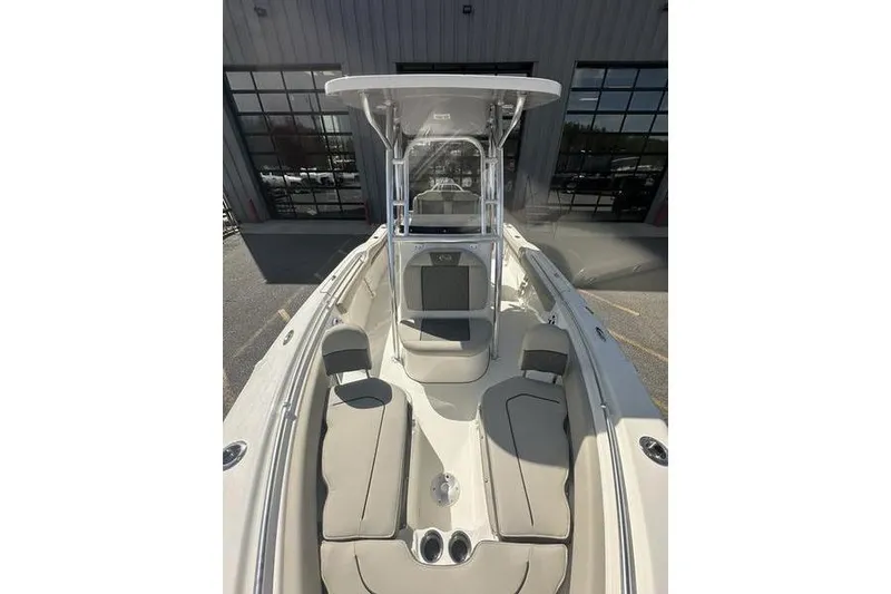 Slide: The Image of 2026 Key West 219 FS boat with spacious seating and modern design. - 16