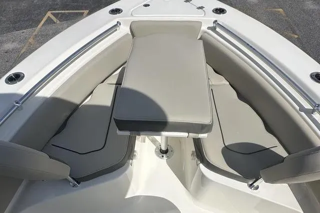 Slide: The Image of Bow seating area of 2026 Key West 219 FS boat with cushioned seats. - 3