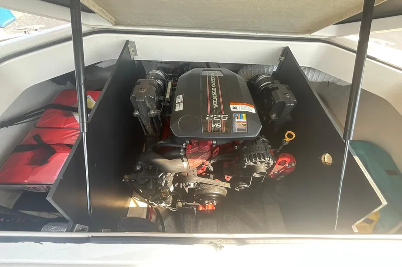 Slide: The Image of 2015 Regal 2100 Bowrider engine compartment with Volvo Penta 225 V6 engine. - 16
