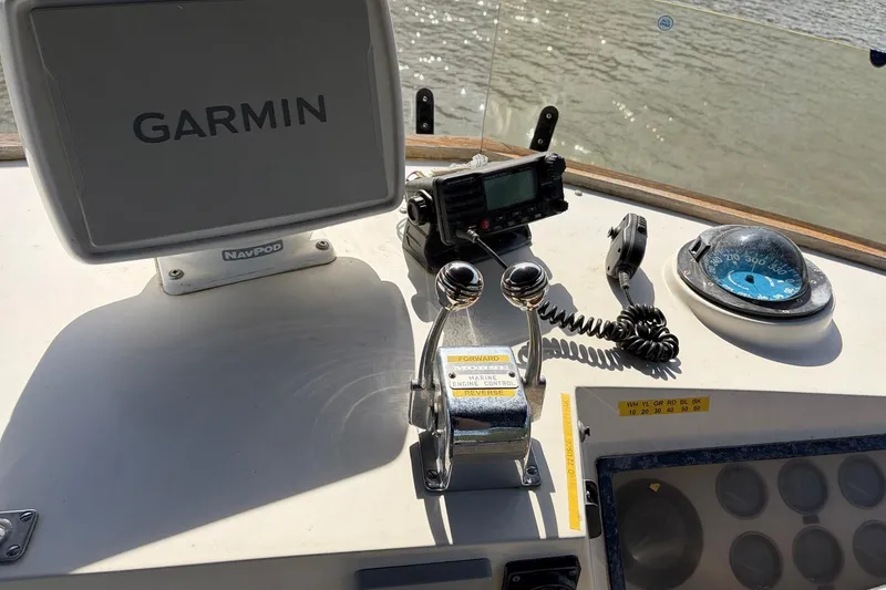 Slide: The Image of Control panel of a 1986 Grand Banks 42 Classic with Garmin navigation system. - 15