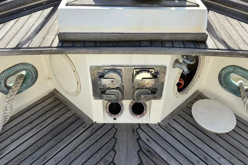 Slide: The Image of Deck of 1986 Grand Banks 42 Classic with nautical equipment and ropes. - 21
