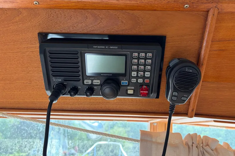 Slide: The Image of VHF marine radio on 1986 Grand Banks 42 Classic boat, featuring Icom IC-M602 model. - 29