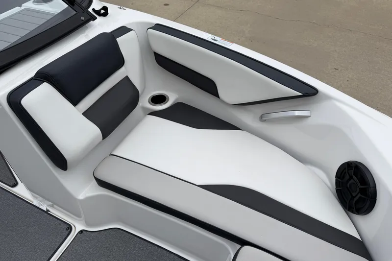 Slide: The Image of 2019 Yamaha Boats SX195 interior seating with black and white upholstery. - 17