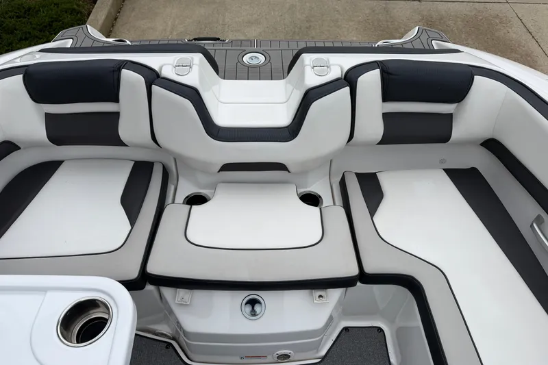 Slide: The Image of 2019 Yamaha Boats SX195 interior seating with sleek, modern design and comfortable upholstery. - 7