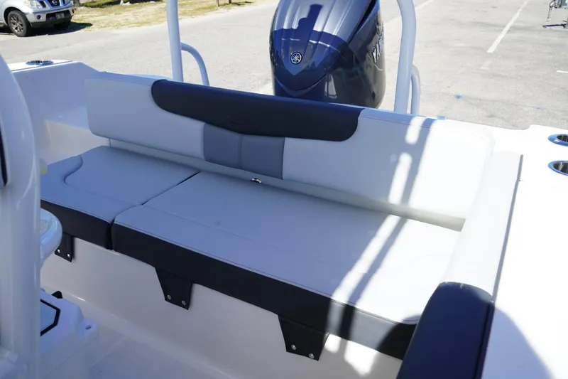 Slide: The Image of 2026 Robalo R202 Explorer boat seating with Yamaha engine in background. - 10